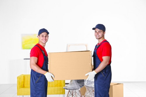 Removal van and moving team in Swiss Cottage preparing for a same-day property move