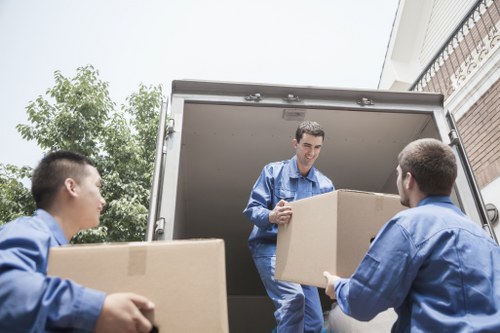 Local house removals team managing access and unloading near Swiss Cottage