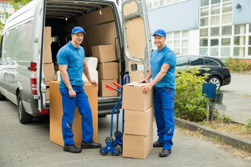 Wardrobe boxes and wrapping supplies prepared for a Swiss Cottage relocation