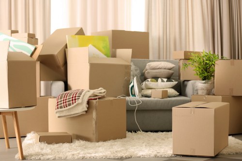 Careful loading of household furniture into a removal van in Swiss Cottage